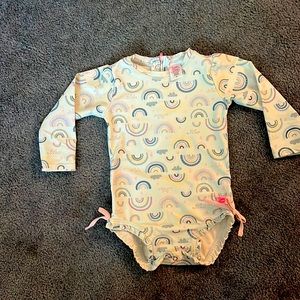 Ruffle butt rash guard one piece bathing suit